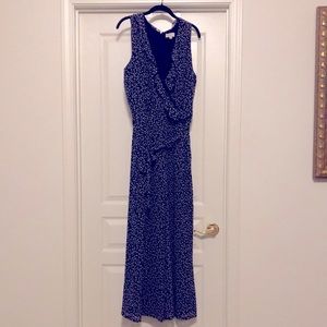 Loft flare leg, v-neck jumpsuit with waist tie.